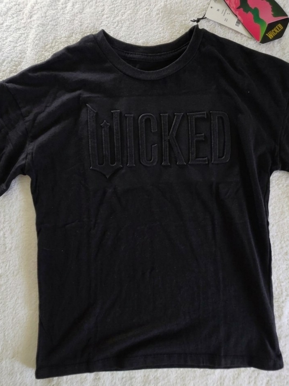 NWT Wicked Movie x Paul Tazewell Black Embossed Logo Tee Shirt Size Medium